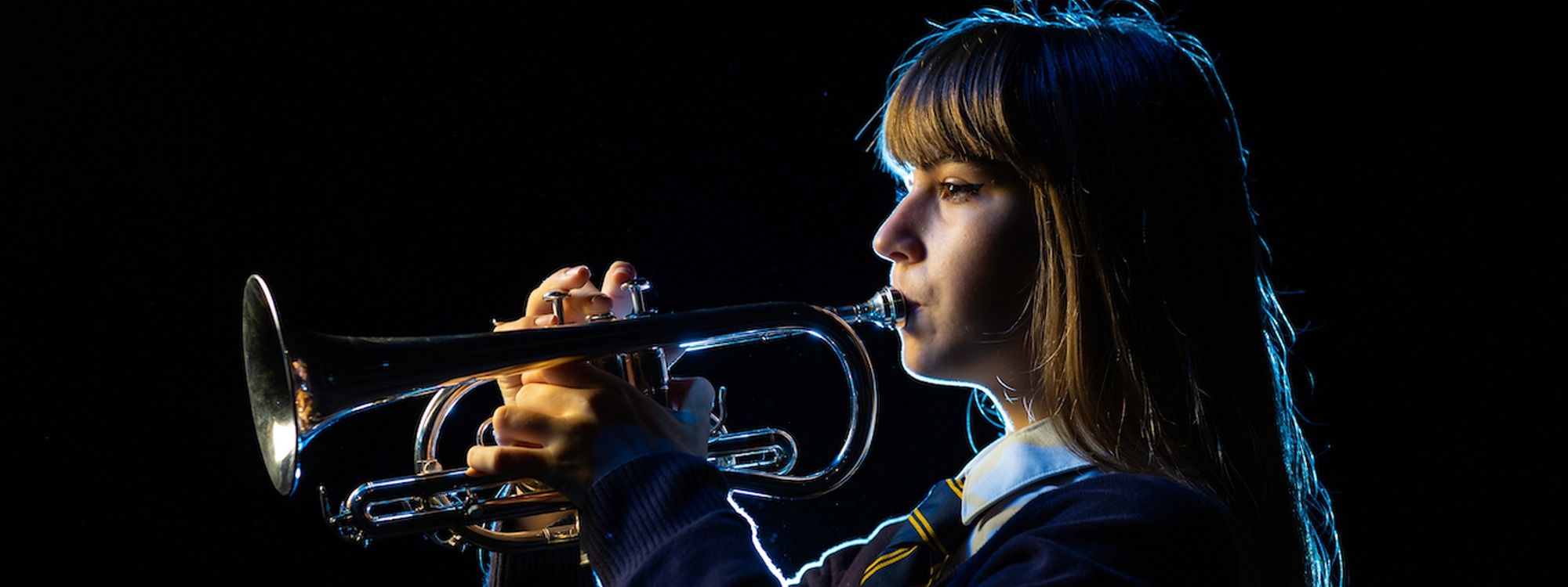 Girl playing trumpet